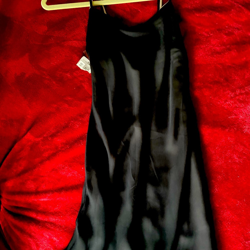 Jonathan Martin double reverse two color dress. More for like a small Petite.